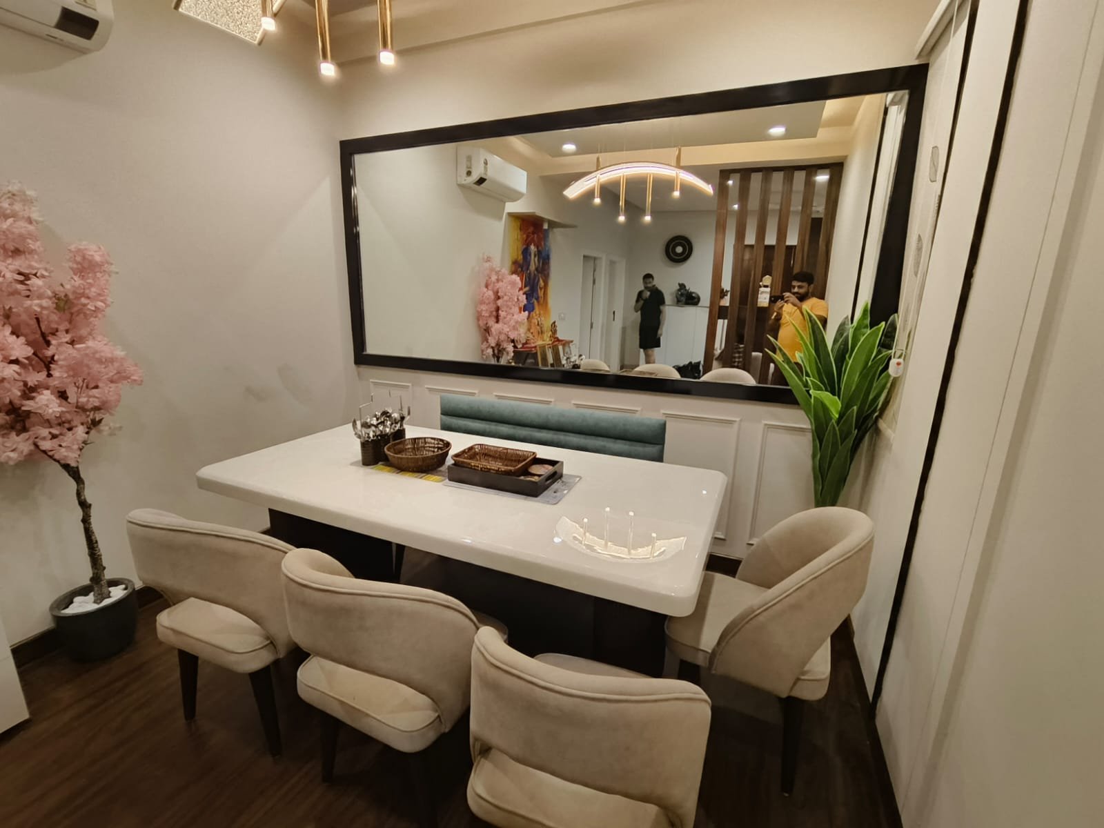 Dining with full-width mirror wall