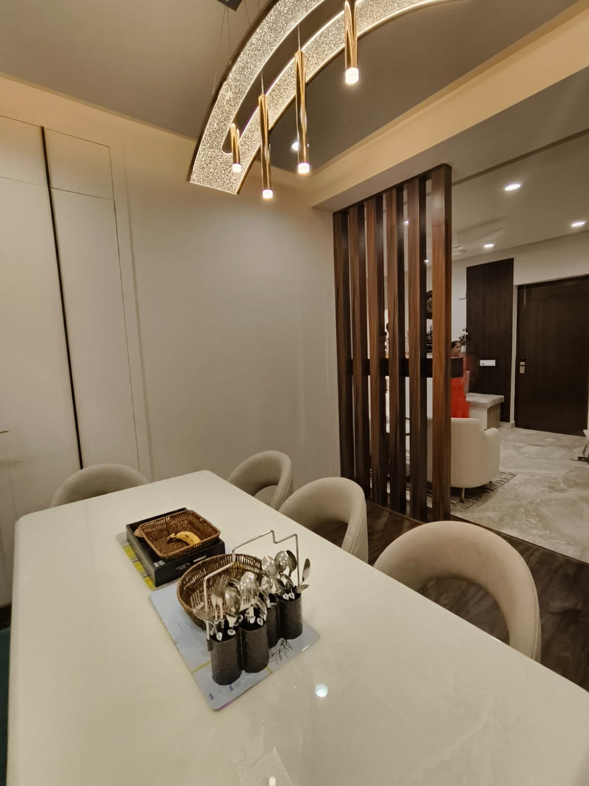 Sculptural pendant light over dining