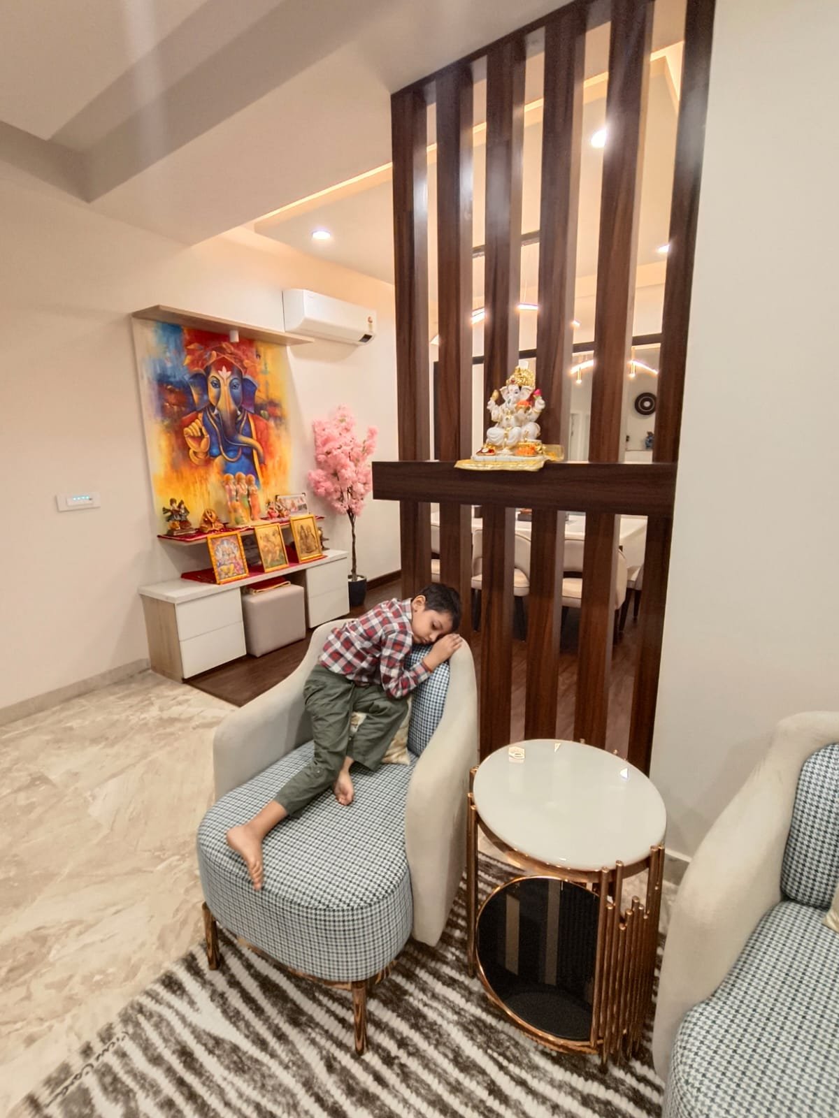 Foyer with wooden slat divider