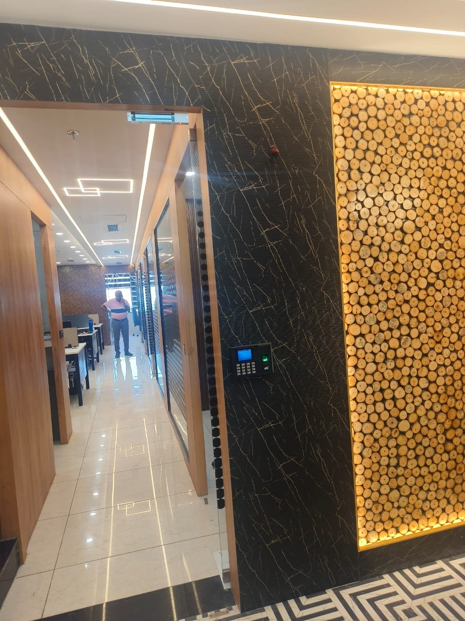 Entrance corridor with marble-look panels