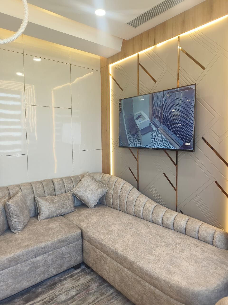Lounge with brass-inlay wall panels